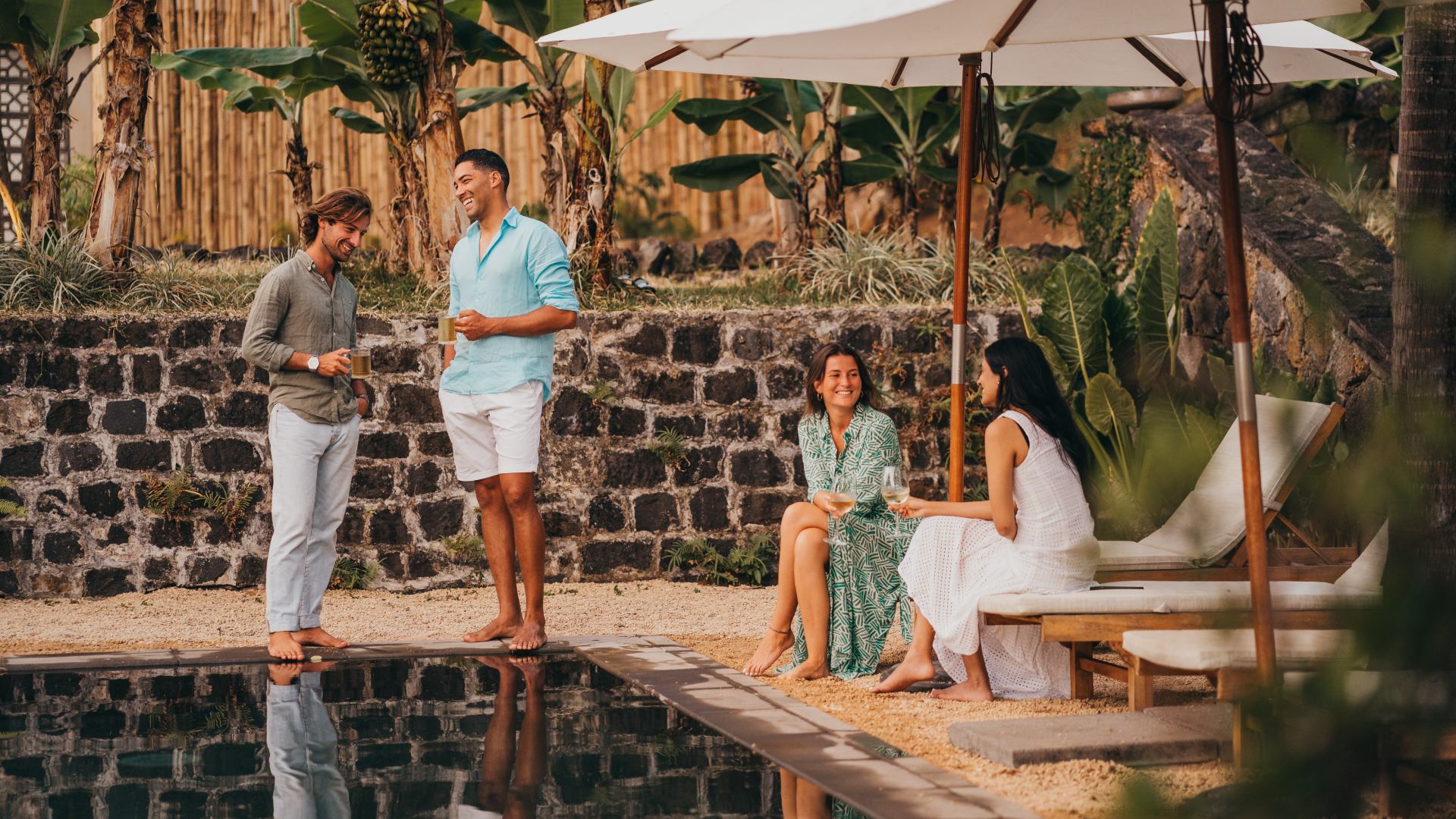 Parents unwinding by the pool at Kaz'alala