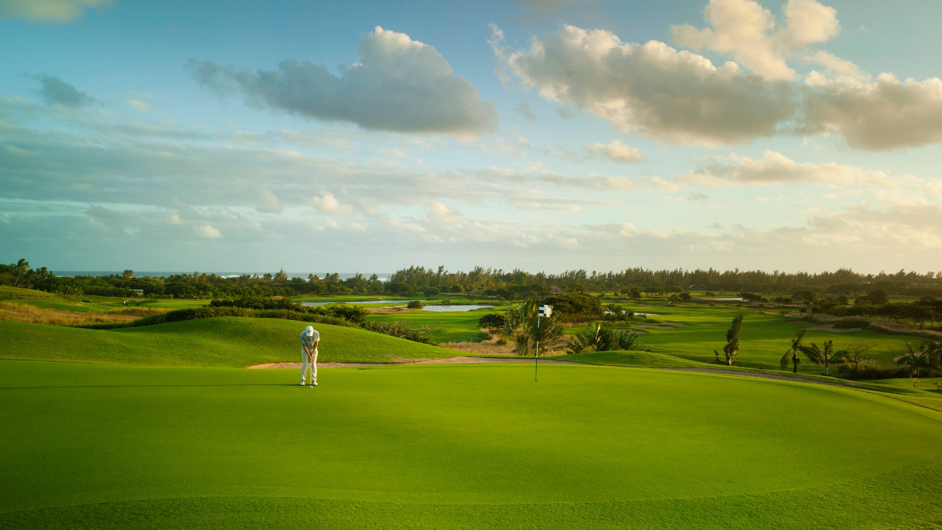 A man plays on the Heritage Bel Ombre Golf Club in Mauritius.