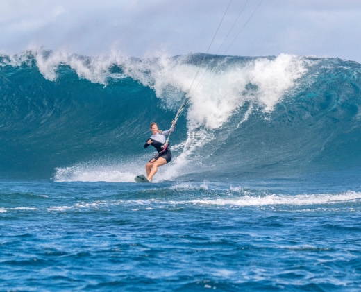 Kitesurfer riding on waters in Mauritius