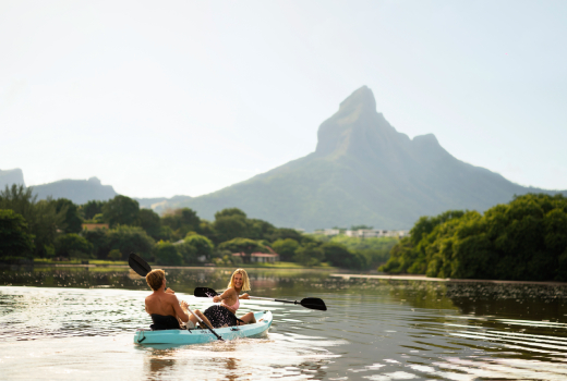 Kayaking in the calm lagoon waters of Bel Ombre, south-west Mauritius