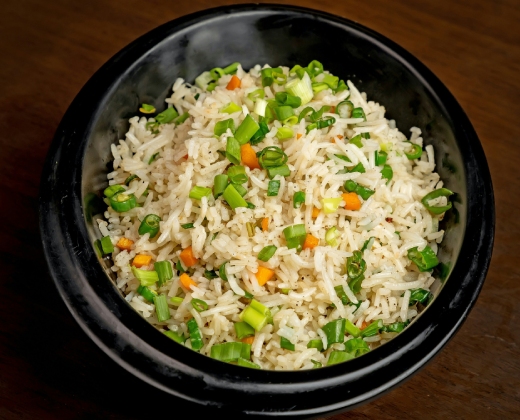 Traditional Mauritian fried rice prepared with vegetables, eggs and local flavours