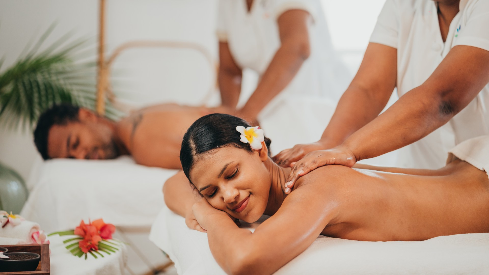 A woman being pampered with a massage in a luxurious spa located in Mauritius.
