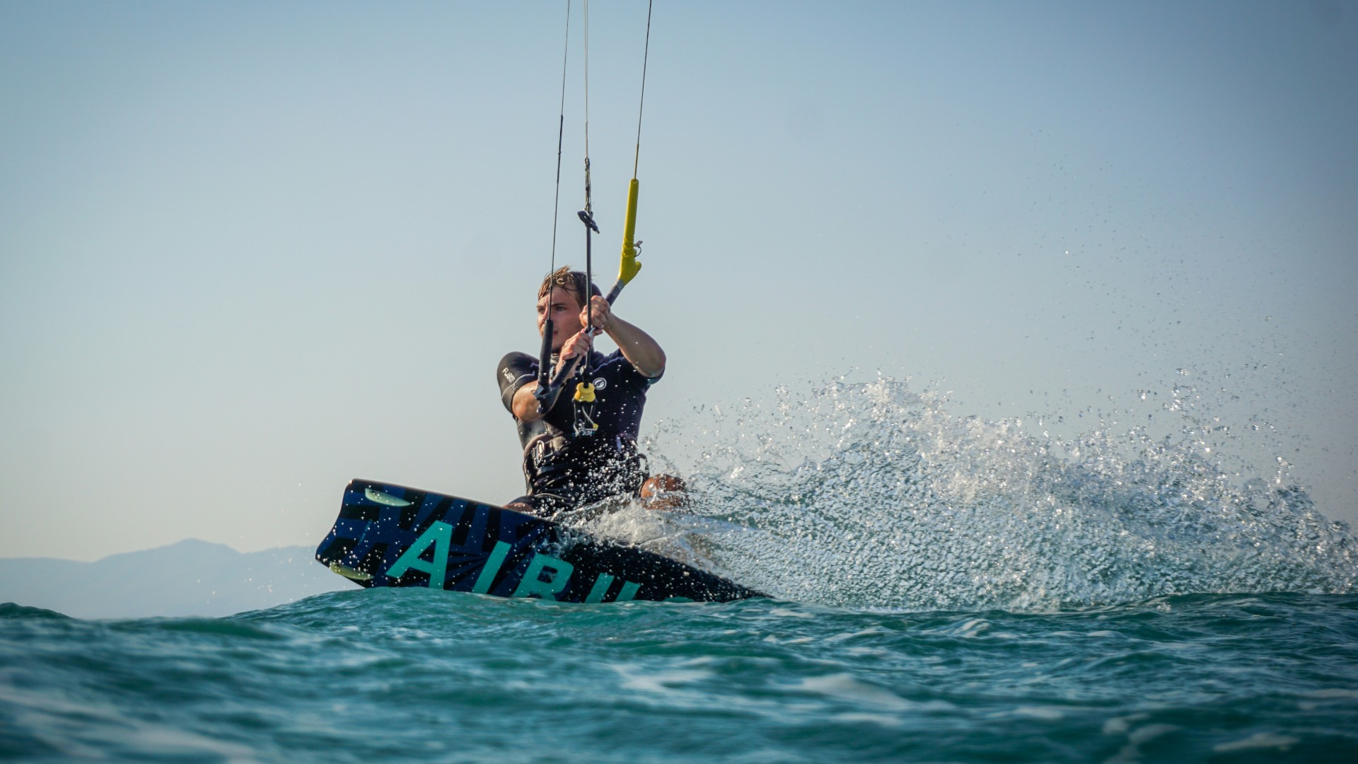 Feel the thrill of kitesurfing in Bel Ombre, Mauritius, where the crystal clear lagoon meets the perfect wind for an unforgettable ride